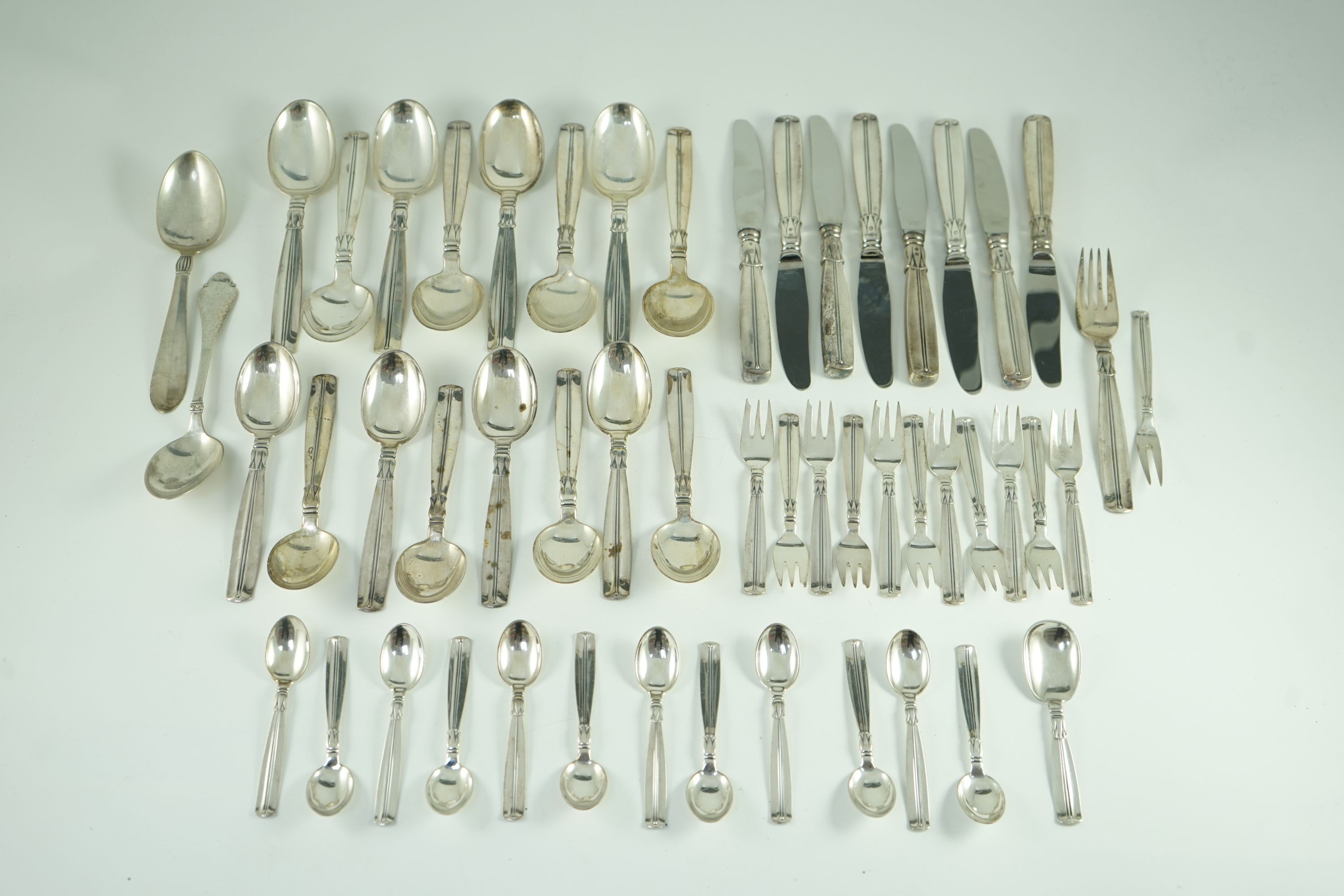 A mid 20th century harlequin part canteen of Danish 830 standard flatware by Broderne, W & S Sorensen
